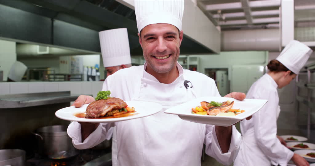 Hombre Con Gorro De Cocinero Y Uniforme. Cocina Y Concepto De